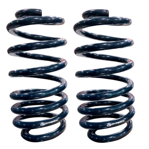 A pair of Rear Dual-Rate Coil Springs, 4" Drop | 1963-1972 C10 on a white background.