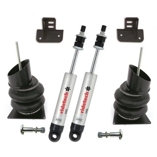 A set of Front CoolRide, 55-57 Chevy OEM shocks and springs for a car.