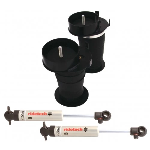 A set of Rear CoolRide Air Spring and Shock Kit | 1991-1996 GM B-Body and a black hose.